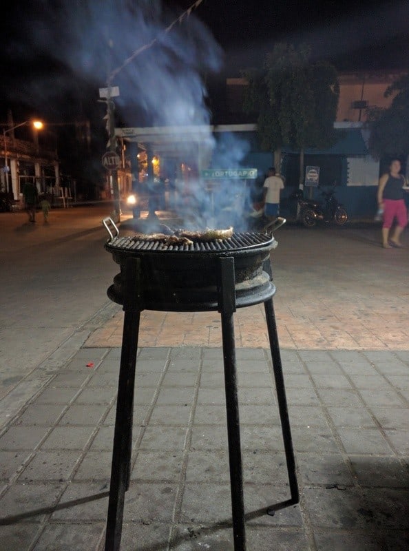 Grilling asada for tacos in Cuyutlan, Colima