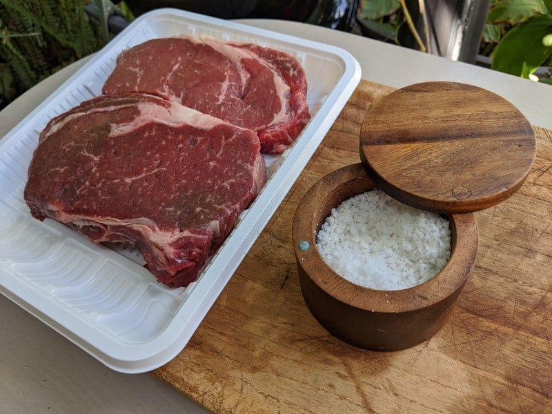 Ribeye steaks prepared with Colima sea salt ready for the barbeque